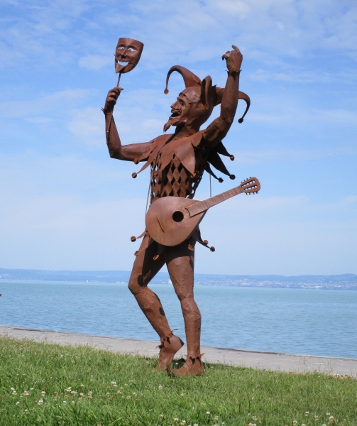 Harlequin life size sculpture rusty